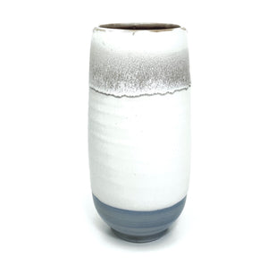 Horse Tail on White Cylinder with Blue Base